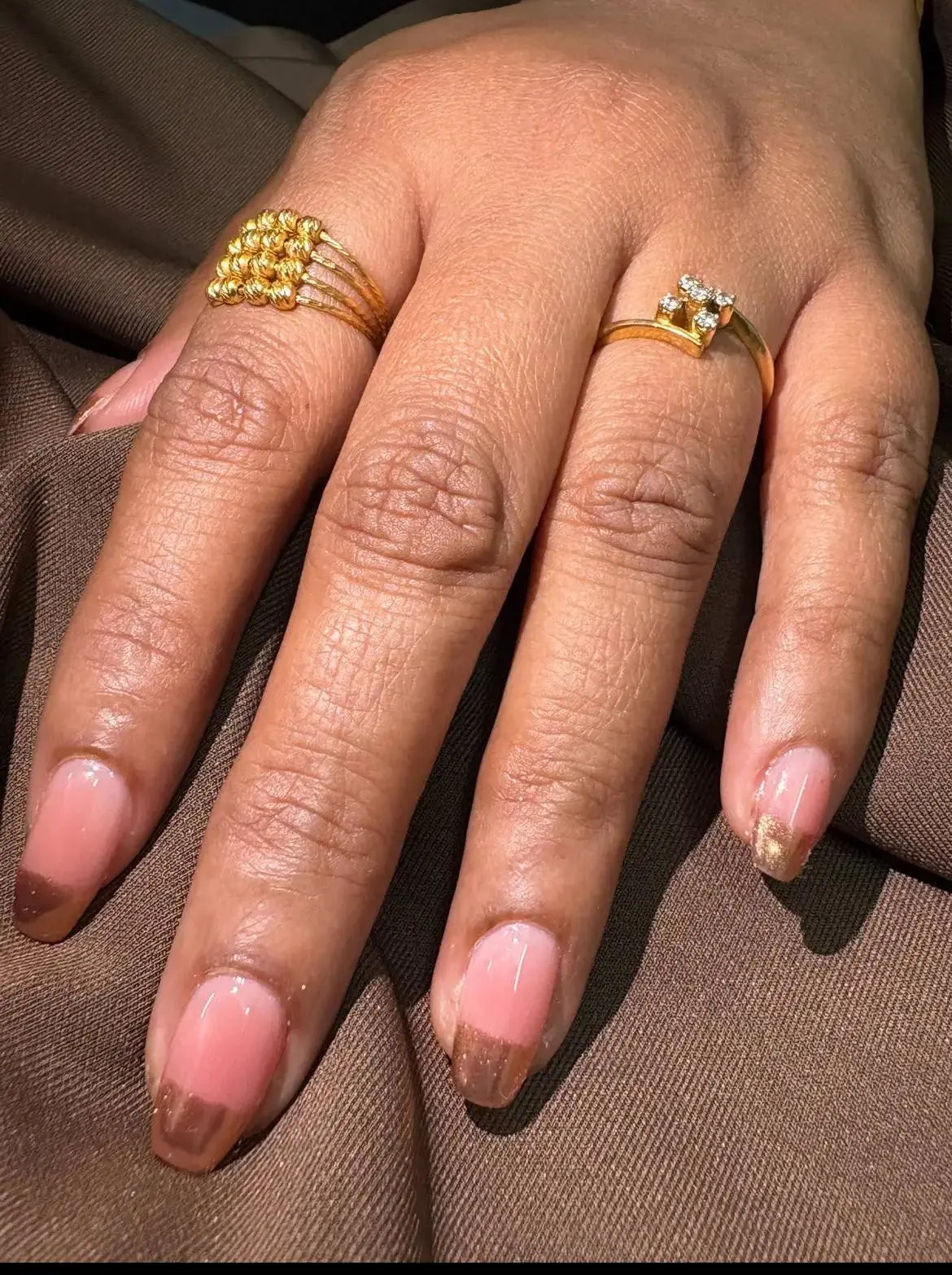 Femiz custom nail art design with a soft luxury finish