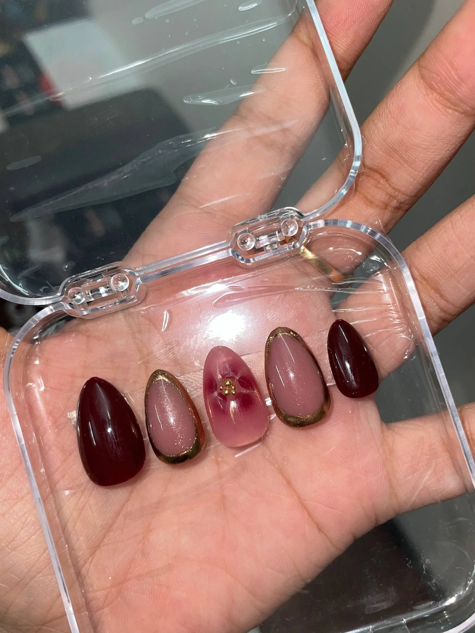 Femiz custom nail art design with a soft luxury finish